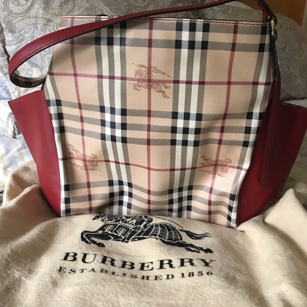 Red accent Burberry bag!